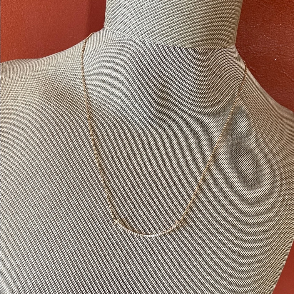 Tiffany “Small Smile” rose gold & diamond necklace.